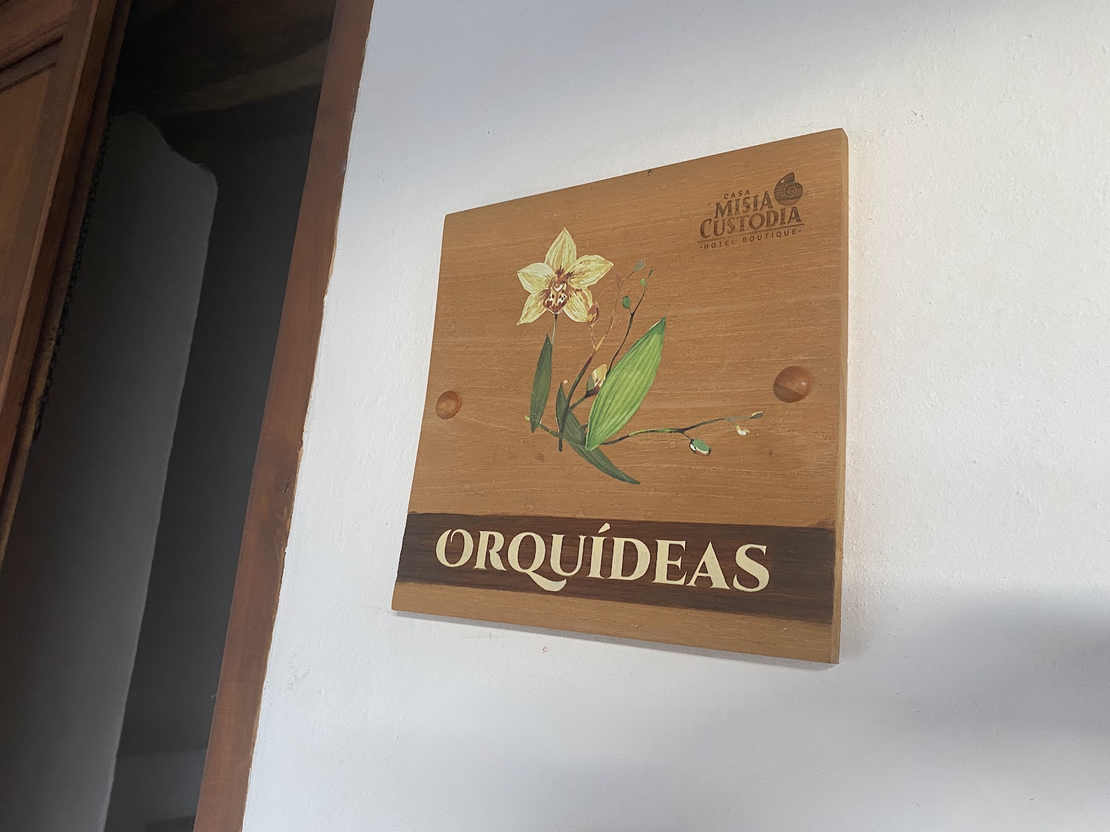 Placa de la habitación Orquídeas